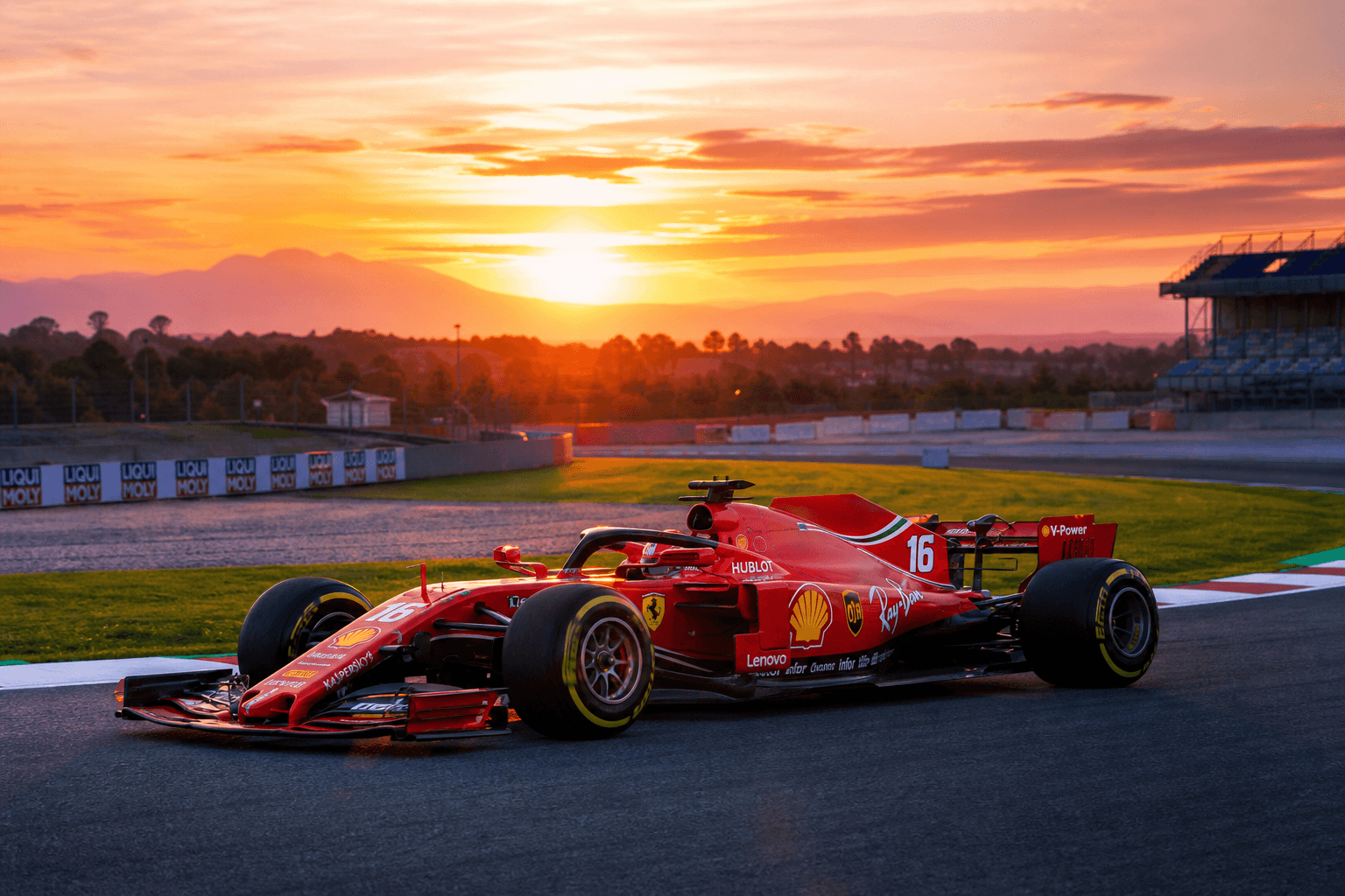Race car on track at sunset